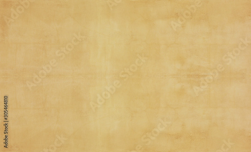 Old beige background surface. Rough sandy or stone canvas, empty light brown wallpaper, blank wall banner 