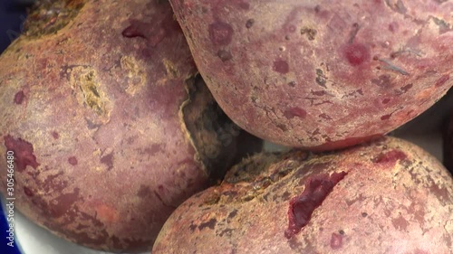 Hot boiled beetroot. Shooting in kitchen. photo