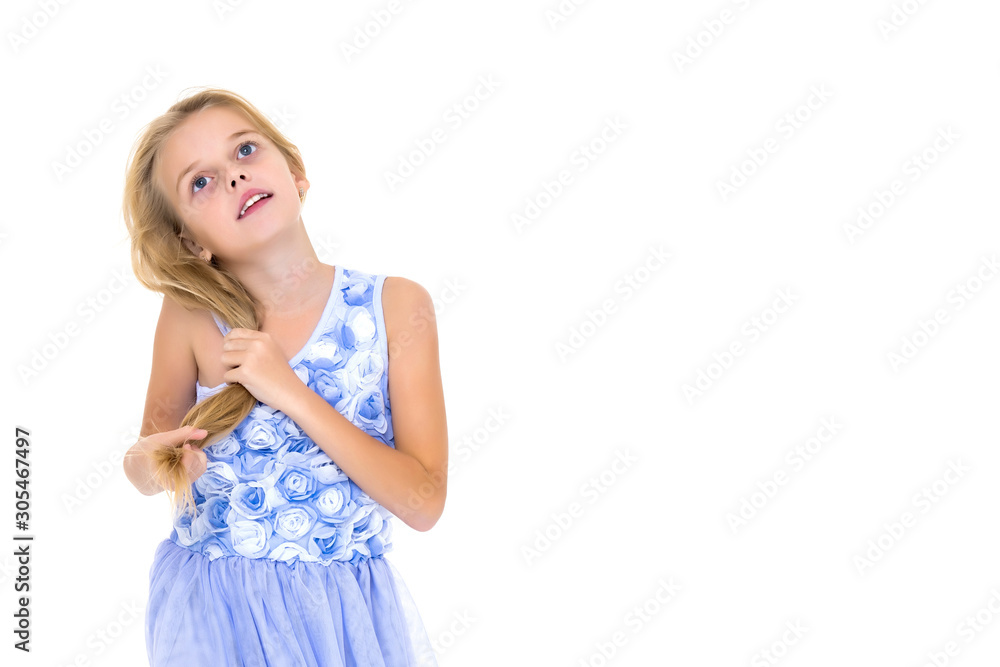 Little girl in a dress developing in the wind. Little girl in a dress developing in the wind.