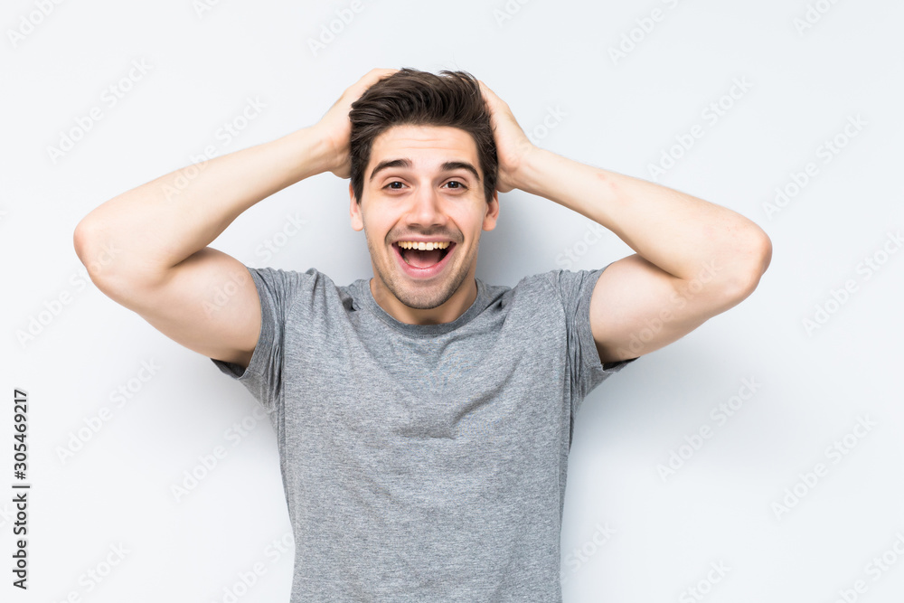 Shocked young man isolated on white background Shocked young man isolated on white background