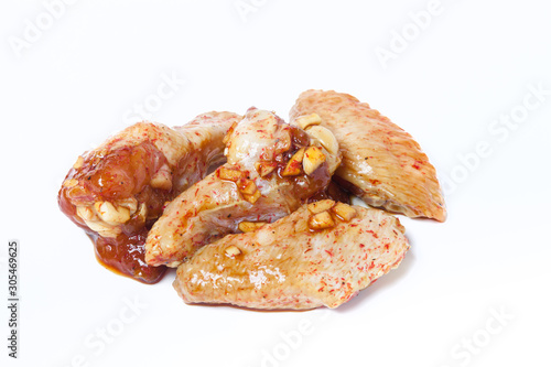 Raw chiken meat on a light background photo