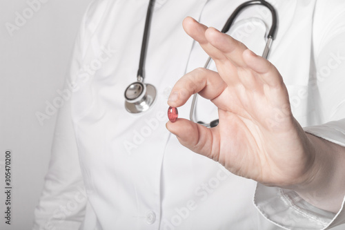 Woman doctor in uniform with a phonendoscope