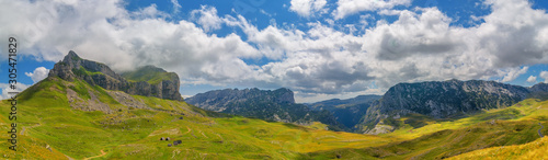 Summer mountaine panorama landscape with cloudy sky. Mountain scenery, National park Durmitor, Zabljak, Montenegro.