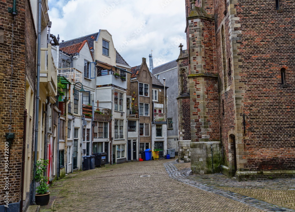 Old street full of houses in Gouda, Netherland