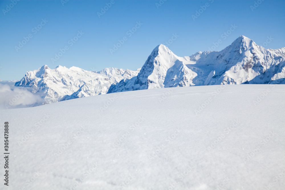 amazing snow covered peaks in the Swiss alps Jungfrau region from Schilthorn