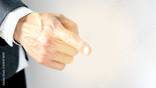 Foto Businessman point his finger on virtual object.