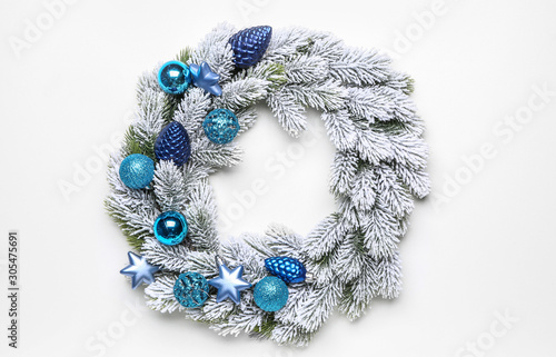 Beautiful Christmas wreath on white background © Pixel-Shot
