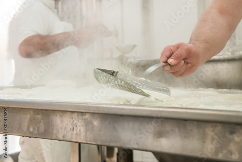 Caseificio con lavorazione mozzarella di bufala photo