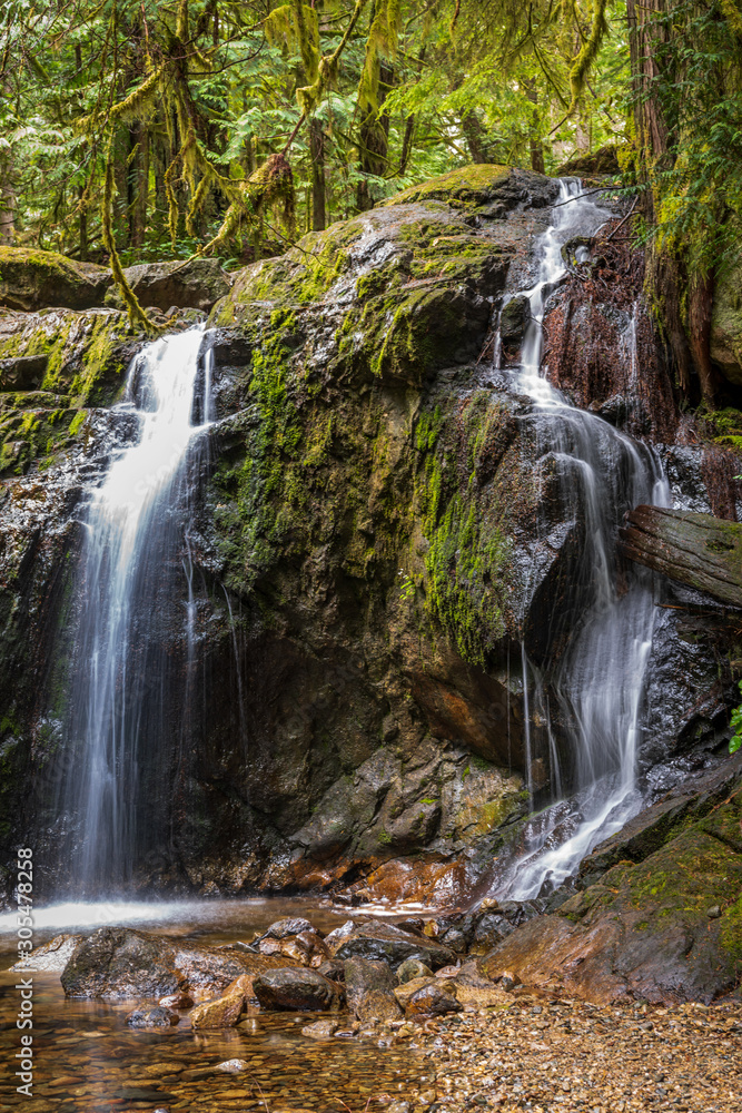 Small mountain creek in Vancouver, Canada. Long exposure water flow. Small mountain creek in Vancouver, Canada. Long exposure water flow.
