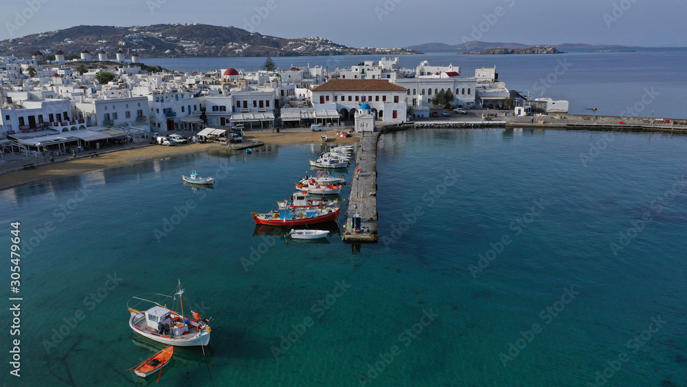 Aerial drone panoramic photo of picturesque old port in main village of Mykonos island at sunrise with beautiful colours, Cyclades, Greece