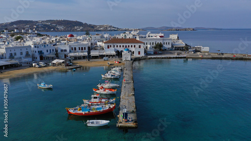 Aerial drone panoramic photo of picturesque old port in main village of Mykonos island at sunrise with beautiful colours, Cyclades, Greece © aerial-drone