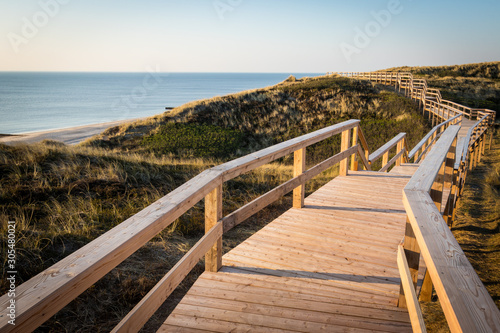 Strandtreppen Wanderweg auf der Insel Sylt mit Blick auf den Strand vom Kliff photo