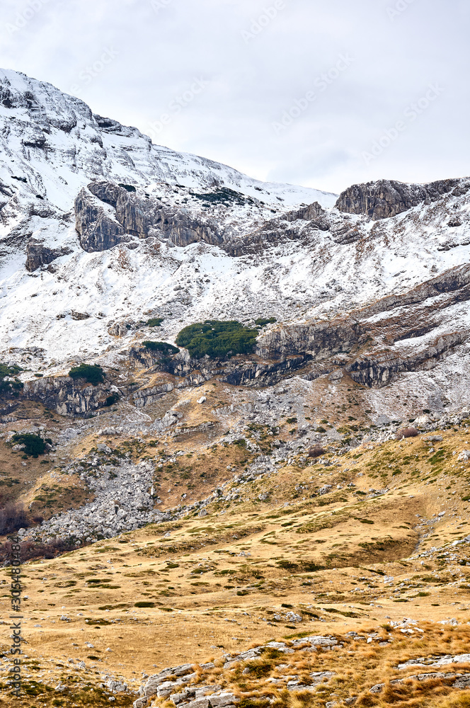 Obraz premium Montenegro snow landscape, Durmitor. Layers of mountains and clouds. Montenegro national park Durmitor. Cloudy landscape. Nature autumn view