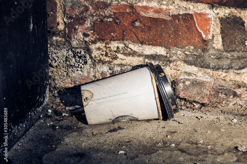 Vászonkép Discarded take-away coffee cup