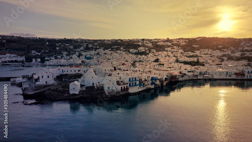Aerial drone panoramic photo of picturesque old port in main village of Mykonos island at sunrise with beautiful colours, Cyclades, Greece
