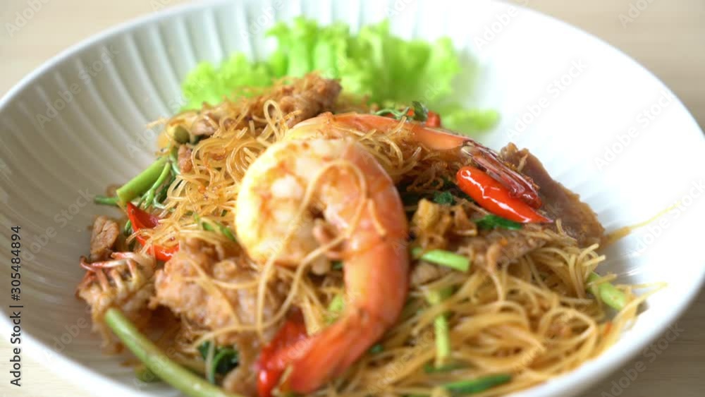 fried white vermicelli and water mimosa with spicy sauce fried white vermicelli and water mimosa with spicy sauce