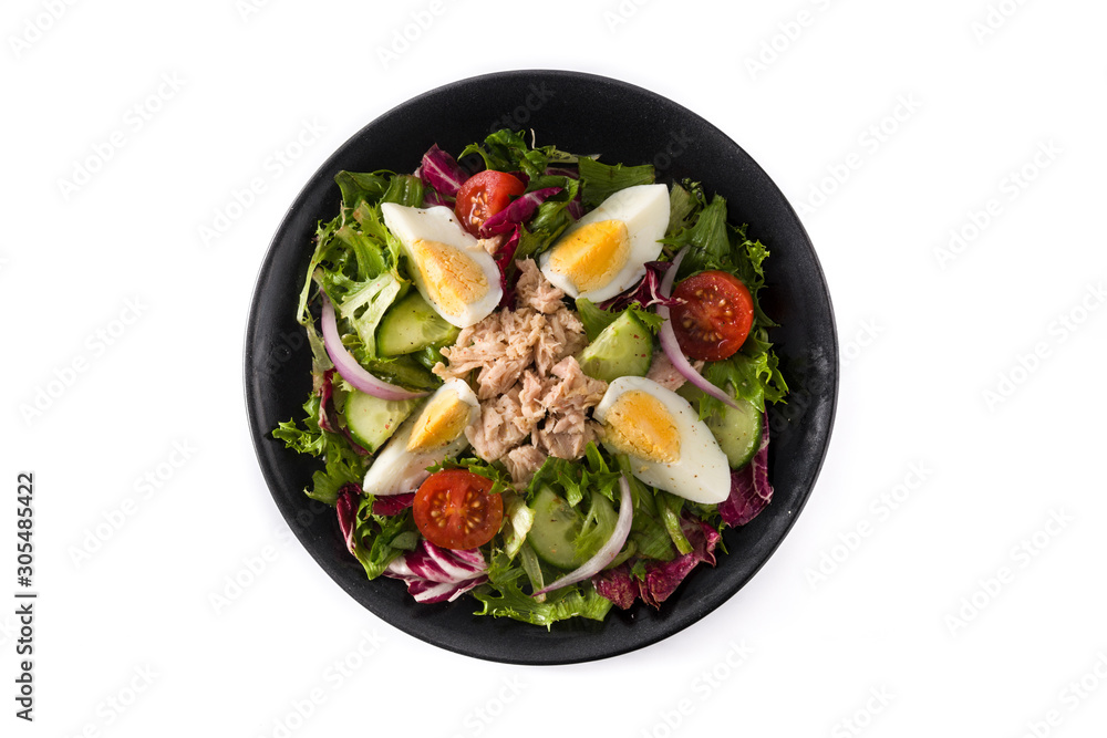 Salad with tuna, egg and vegetables isolated on white background. Top view Salad with tuna, egg and vegetables isolated on white background. Top view