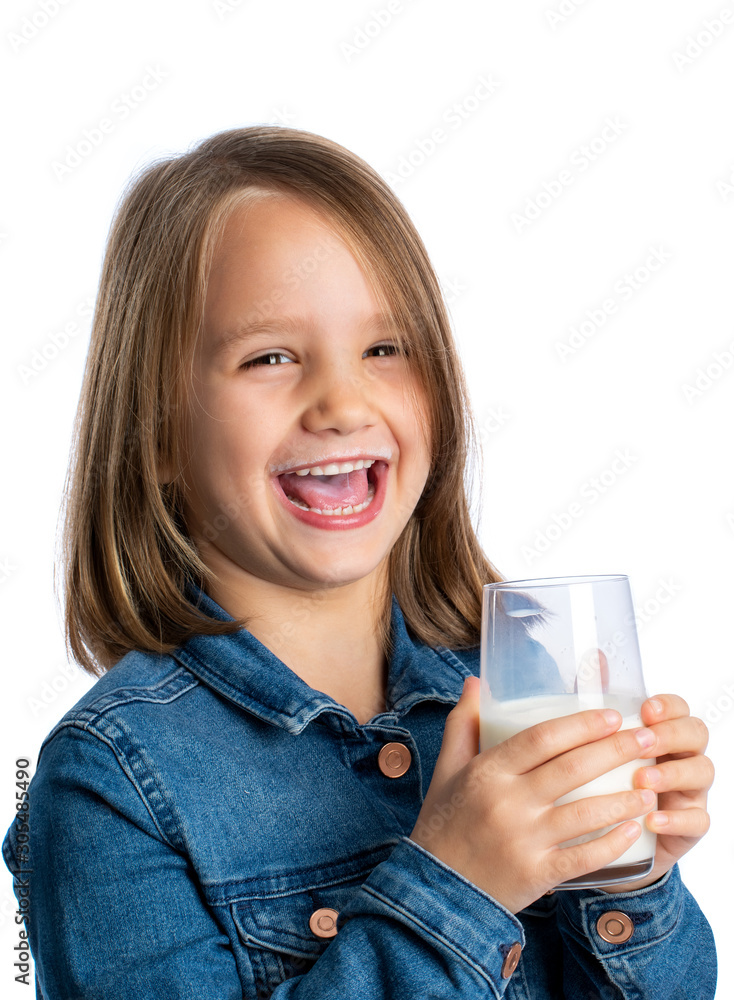 Cute kid with glass of milk laughing Cute kid with glass of milk laughing