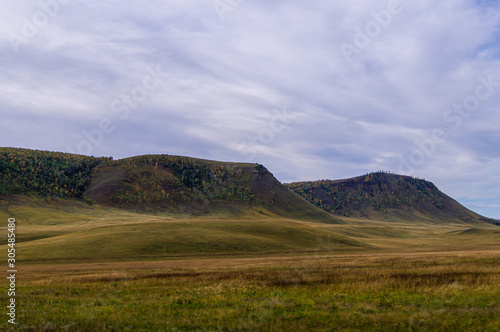 Hills. Sky. The clouds. Steppe