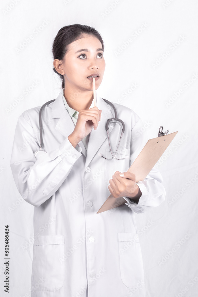 closeup portrait on Asian medicine doctor woman isolated white background. closeup portrait on Asian medicine doctor woman isolated white background.