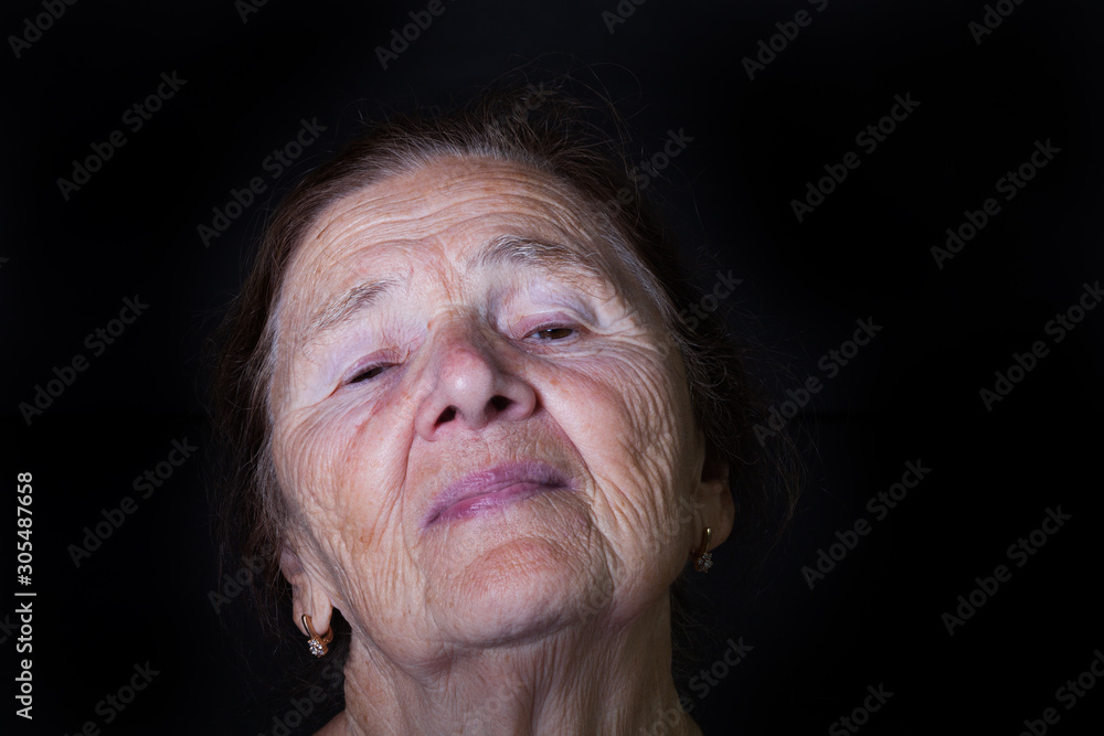 Portrait of an elderly woman with bright emotions on his face Portrait of an elderly woman with bright emotions on his face