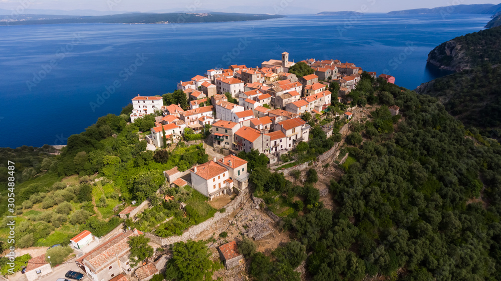 Aerial view of Beli cityscape at the top of mountain, Cres island, Croatia. Aerial view of Beli cityscape at the top of mountain, Cres island, Croatia.