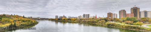 Panorama of Saskatoon, Canada cityscape over river
