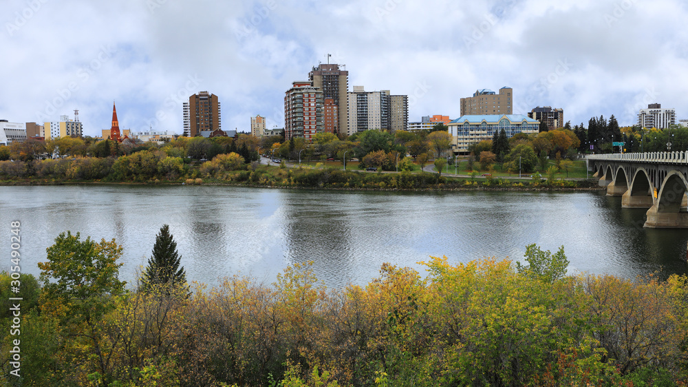 View of Saskatoon, Canada cityscape over river View of Saskatoon, Canada cityscape over river