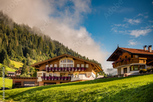 Guesthouse in calm place, mountains and nature, Austria, tourism concept photo