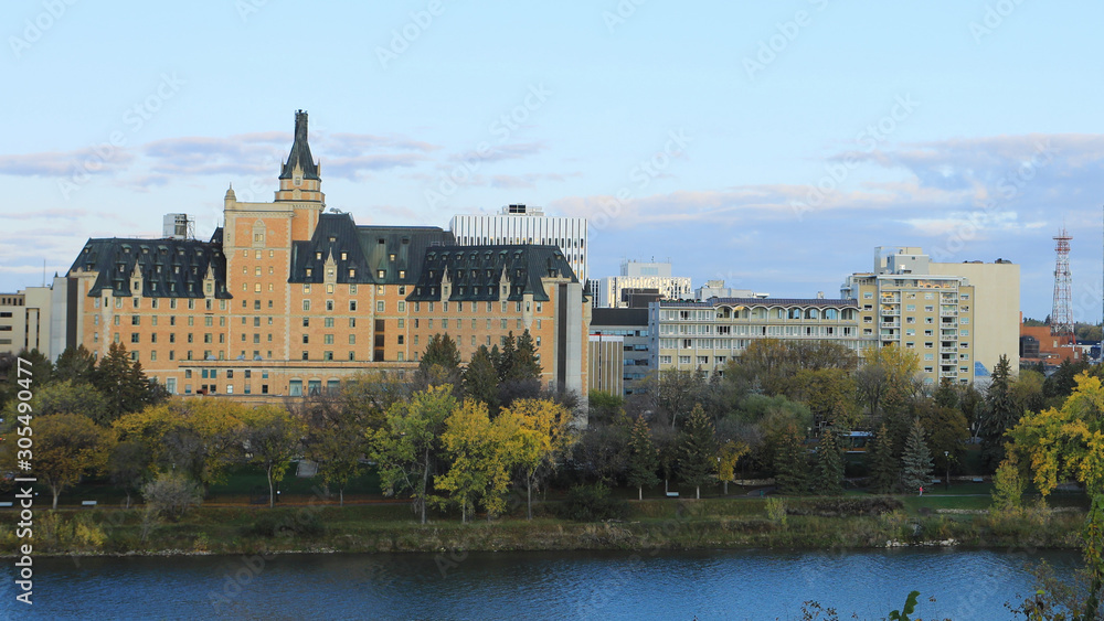 Scene of Saskatoon, Canada cityscape by river