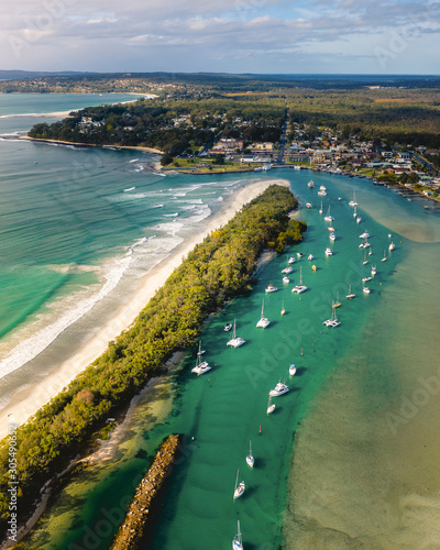 Aerial view of small fishing boats anchored at Jervis Bay, Australia. photo