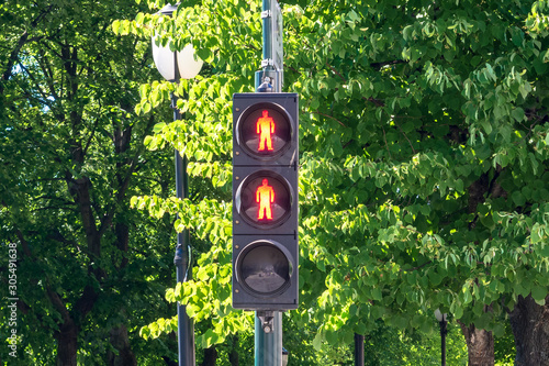 Two red lights Semaphore of pedestrian traffic lights in Oslo, Norway photo