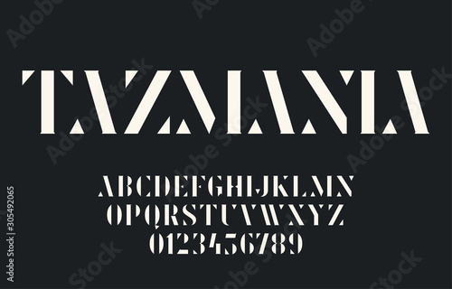 Elegant geometric stencil font with triangular elements and serifs. Vector alphabet and numbers