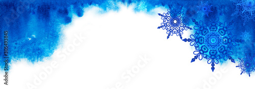 Blue Watercolor background texture with snowflakes and space for text .
