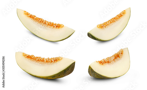 Four yummy green tendral melons in cross-section, isolated on white background with copy space for text or images. Side view. Close-up shot.