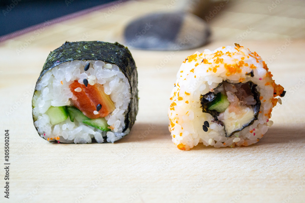 red fish sushi on a wooden tray red fish sushi on a wooden tray