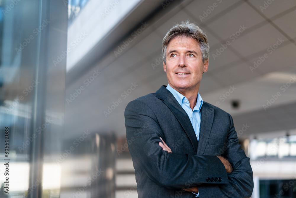Portrait of confident mature businessman in the city Portrait of confident mature businessman in the city