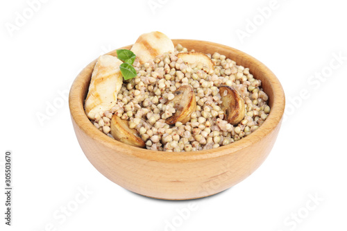 Tasty buckwheat porridge with meat isolated on white