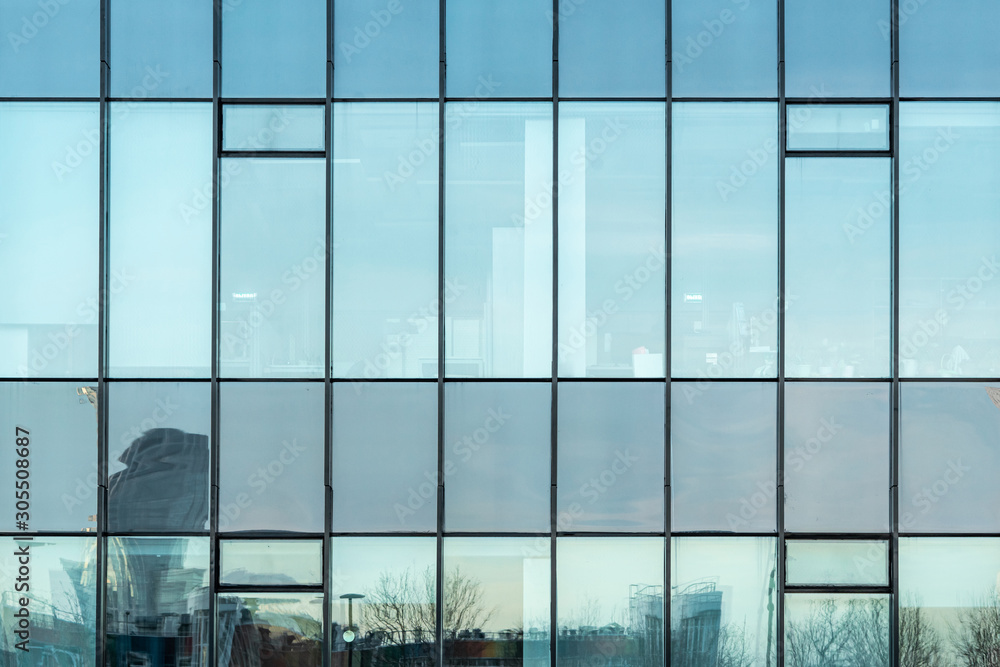 Glass facade texture of a modern office building. High tech architecture.  Elements of urban design. Reflections in the windows. Stock Photo | Adobe  Stock