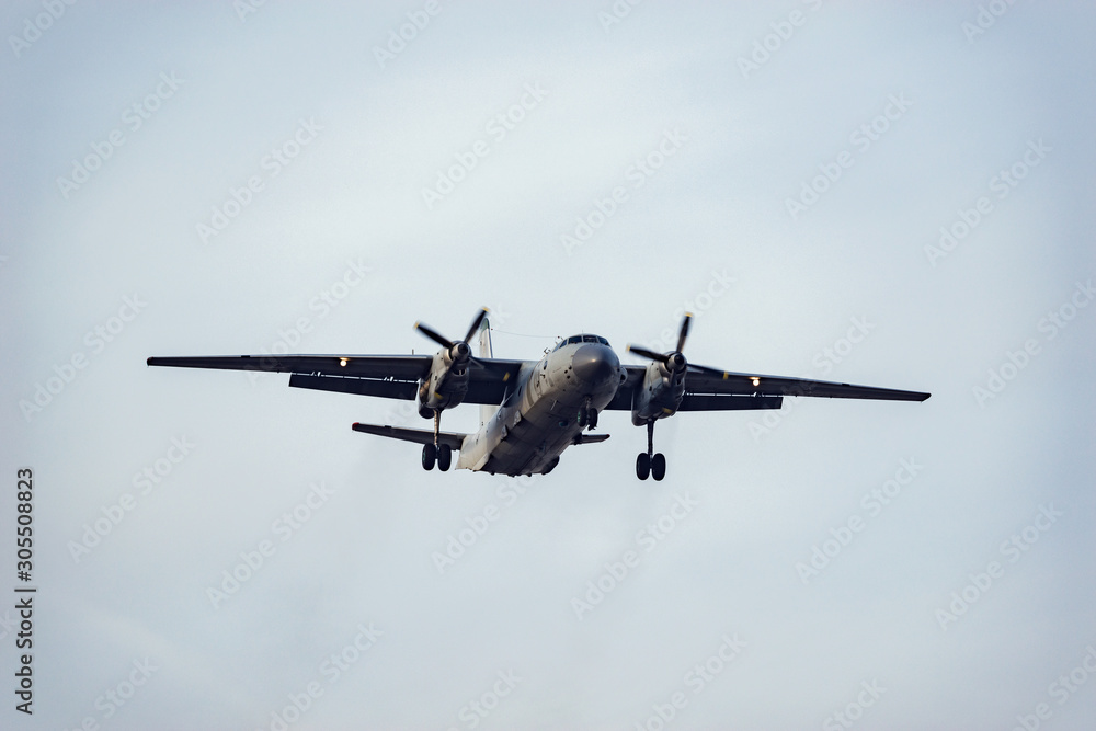 Freight military plane in the clear sky at evening time. Freight military plane in the clear sky at evening time.