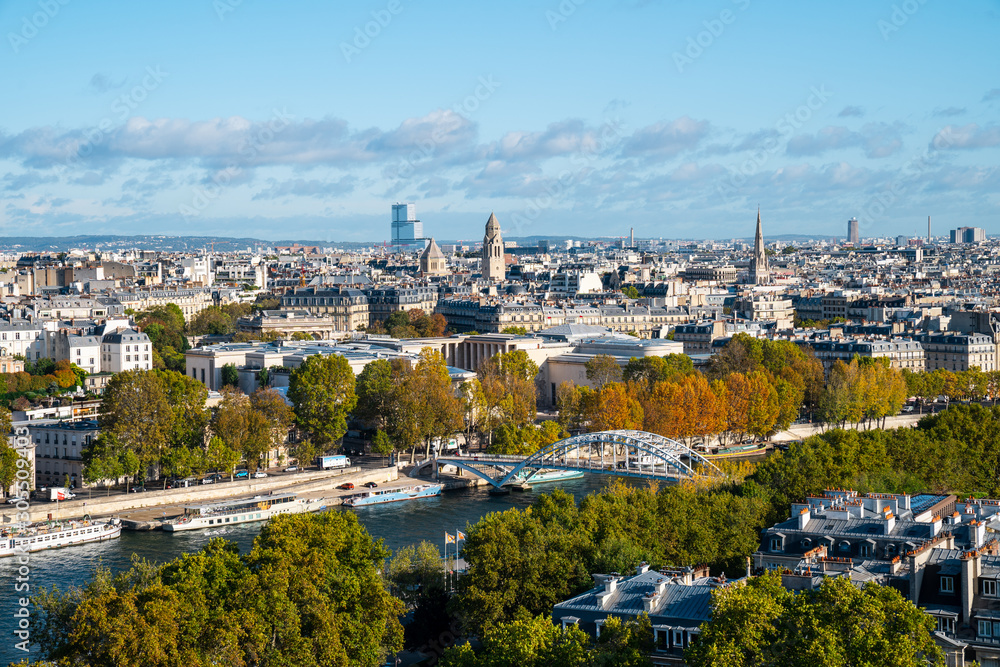 Fototapeta premium Paris sunny cityscape with green trees