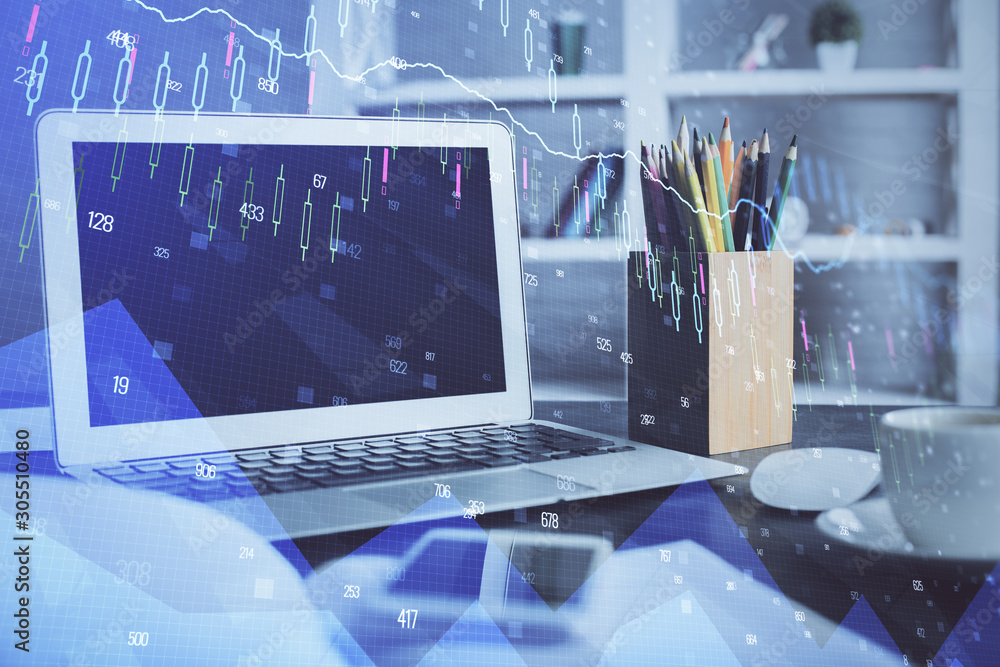 Financial graph colorful drawing and table with computer on background. Multi exposure. Concept of international markets. Financial graph colorful drawing and table with computer on background. Multi exposure. Concept of international markets.