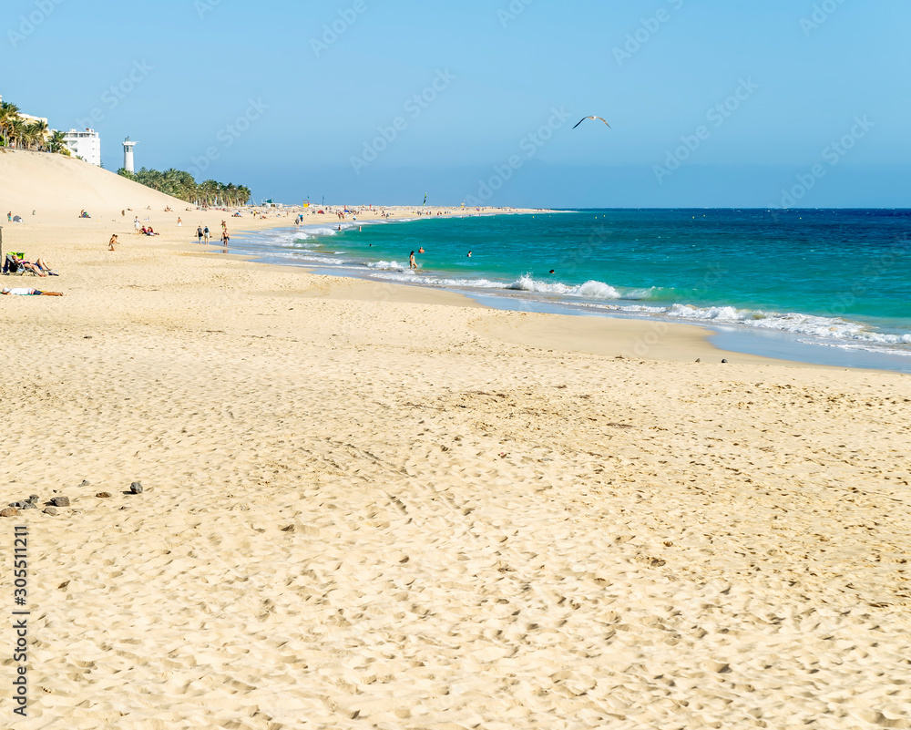 The beach of Morro Jable in Fuerteventura on a beautiful sunny day, Canary Islands, Spain The beach of Morro Jable in Fuerteventura on a beautiful sunny day, Canary Islands, Spain