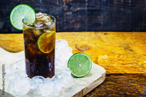 Cuba-libre is an alcoholic beverage, or a cocktail made from rum, cola and lemon soda. The invention of this drink is attributed to US soldiers who helped in the Cuban independence wars. photo