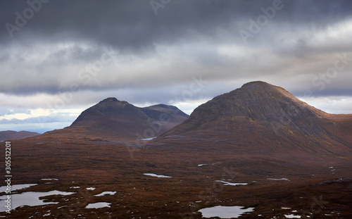 Views of Ceann Beag and Beinn an Eoin from Loch Coire Mhic Fhearchair near Torridon in the Scottish Highlands photo