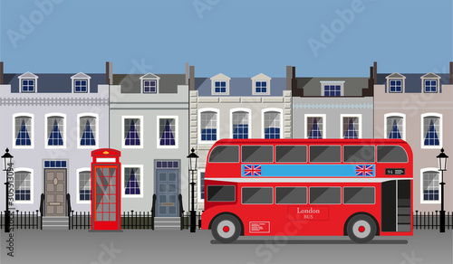 London view with a red double decker bus, a phone box and typical british houses in georgian style architecture. 