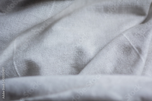 close up of white linen textured cloth background is suitable for use paste text and illustrations.