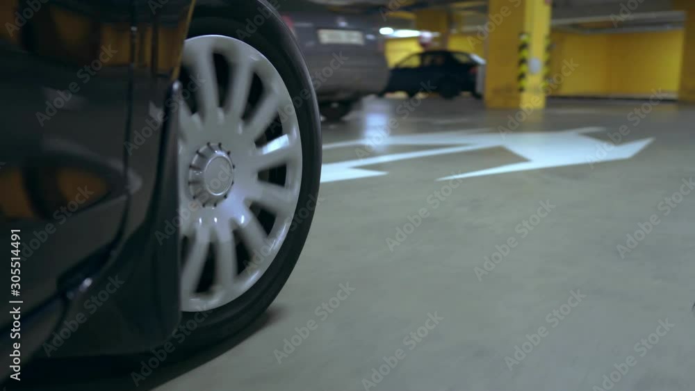 The front wheel of a moving car. The camera is mounted near the wheel. The front wheel of a moving car. The camera is mounted near the wheel.