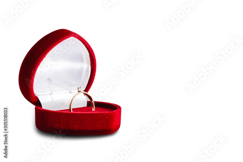 wedding rings in a gift box on white background © Angelov