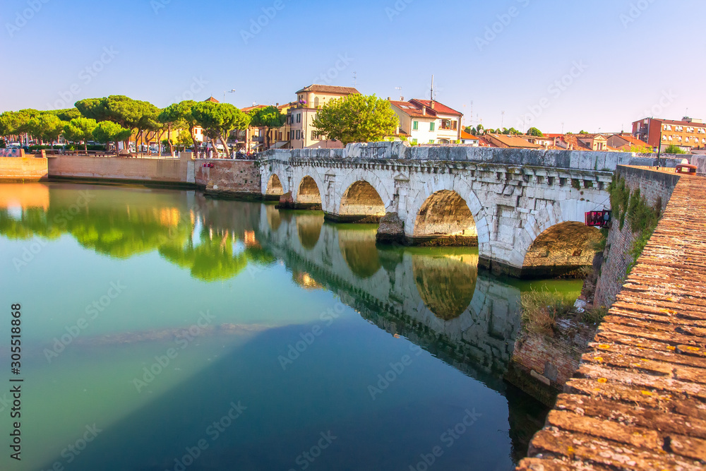 Rimini cityscape. Beautiful city landscape in Rimini, Italy. Famous Tiberius bridge. Ponte di Tiberio